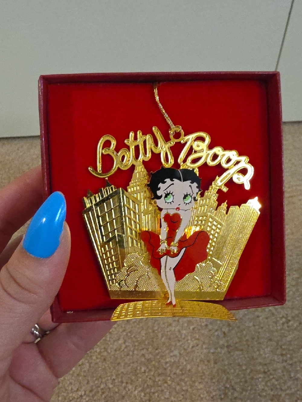 Betty Boop Gold and Red Cityscape Holiday Ornament